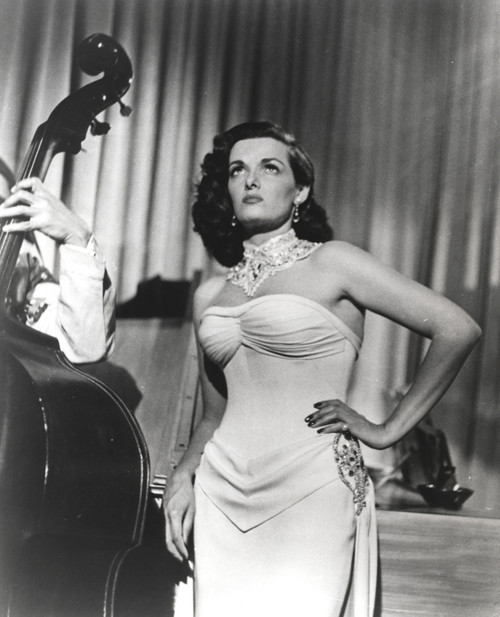Jane Russell Posed in White Strapless Silk Dress and Necklace with Left Hand on the Waist while Eyes Looking Up Photo Print - Item # VARCEL687505