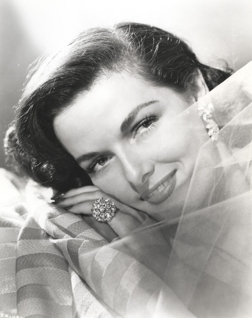 Jane Russell Close Up Portrait in White Sheer Silk Dress and Pearl Earrings with Head Leaning on the Left Hand Photo Print - Item # VARCEL687498
