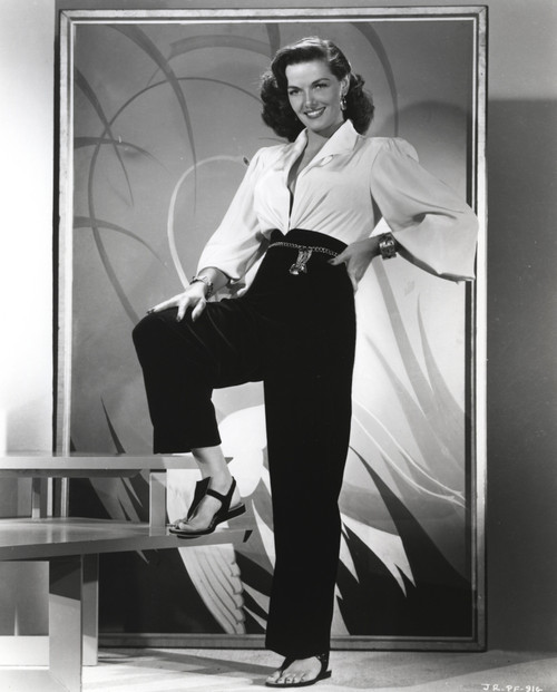 Jane Russell Posed in White Tucked-On V-Neck Long Sleeve Shirt and High Waist Linen Pants with Right Foot on the Stair Photo Print - Item # VARCEL687507