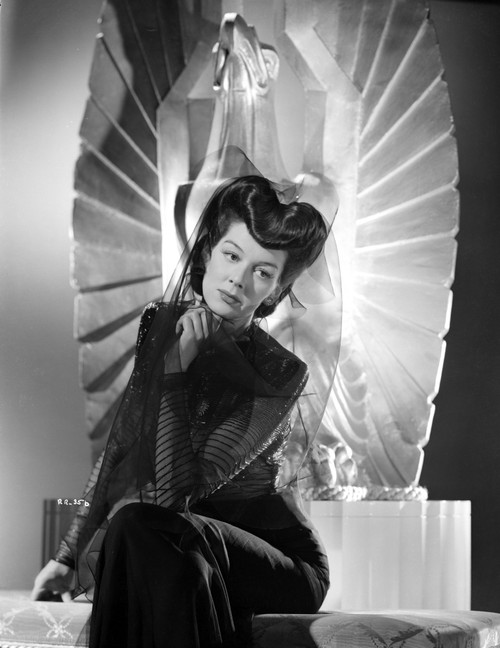 Rosalind Russell Seated on Chair in Black Dress Photo Print - Item # VARCEL687602