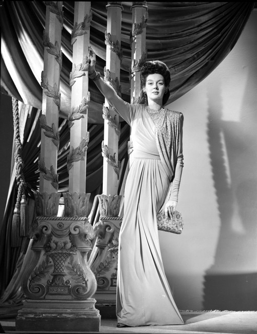 Rosalind Russell Posed in Dress and Holding a Purse Photo Print - Item # VARCEL687610