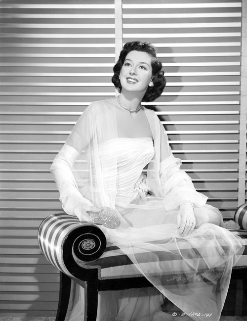 Rosalind Russell smiling in White Gown Photo Print - Item # VARCEL687642