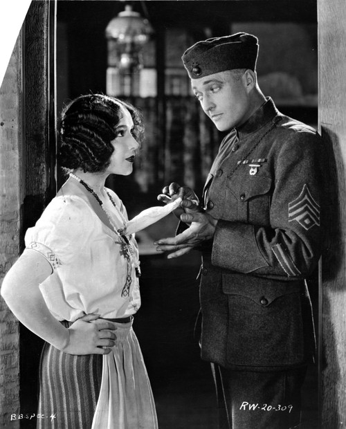 Renee Adoree and a man in military uniform Photo Print - Item # VARCEL687896