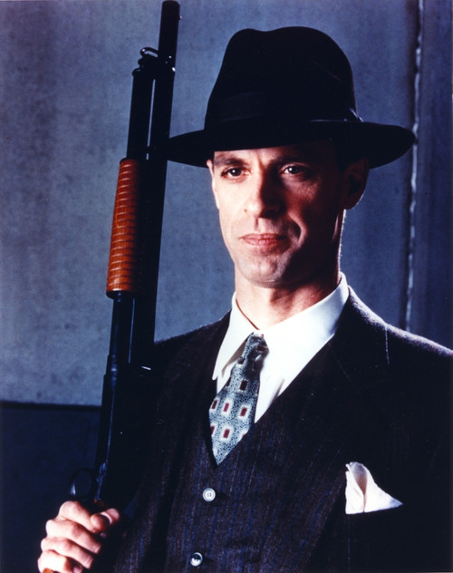 Keith Carradine Posed in Suit with Gun Photo Print - Item # VARCEL687937