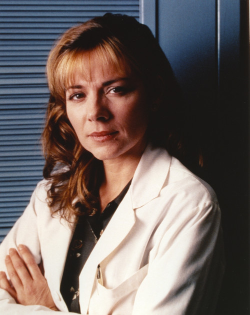 Kim Cattrall Crossed Arms in White Coat Photo Print - Item # VARCEL688000