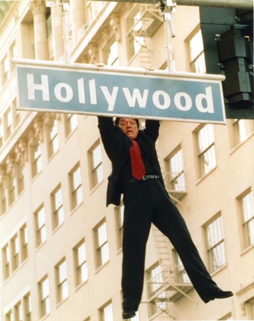Jackie Chan Hanging in Black Coat Photo Print - Item # VARCEL688013