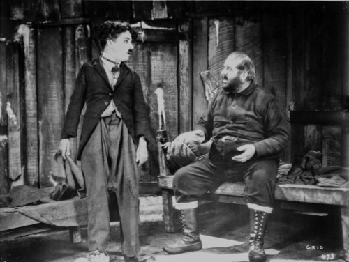 A film still of Charlie Chaplin and a co star Photo Print - Item # VARCEL688133