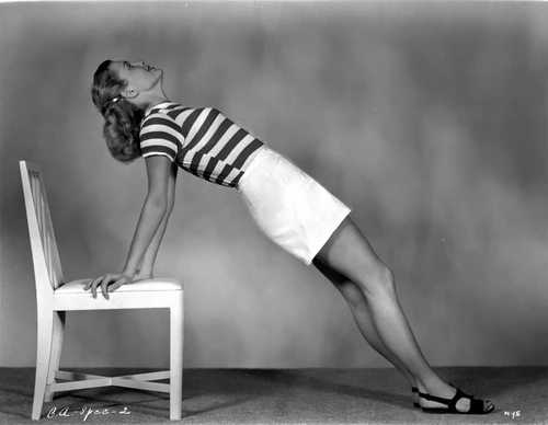 Betty Alexander leaning on chair Photo Print