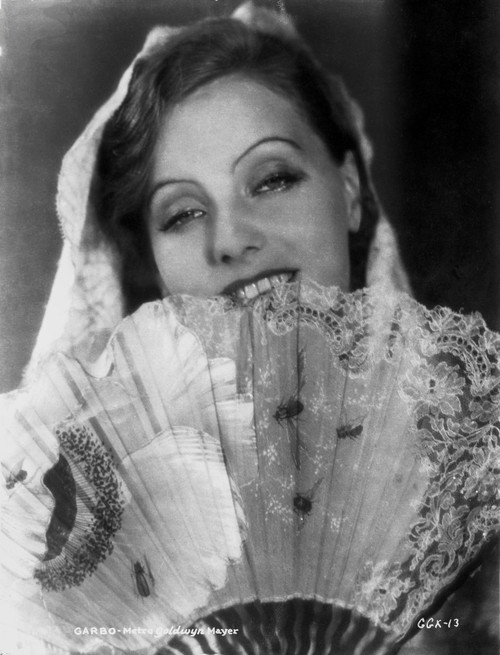Greta Garbo posed with a Fan Photo Print - Item # VARCEL688226