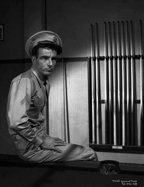 Montgomery Clift Seated in Billiard Table Photo Print - Item # VARCEL688451