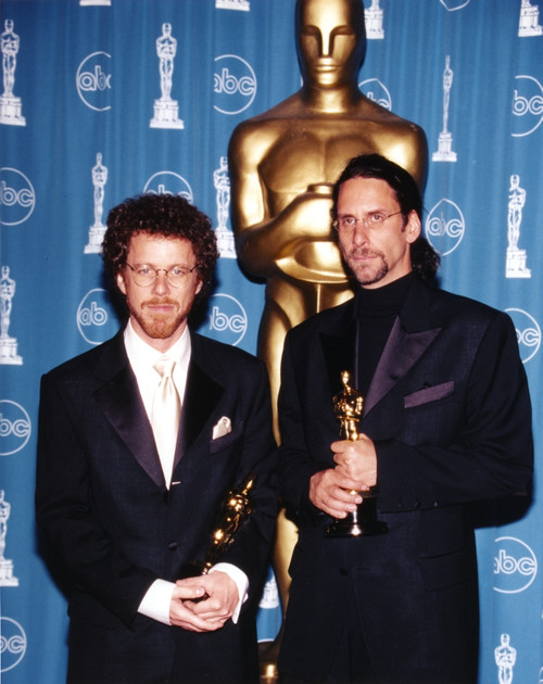 Coen Brothers Holding Trophy in Black Tuxedo Photo Print - Item # VARCEL688486