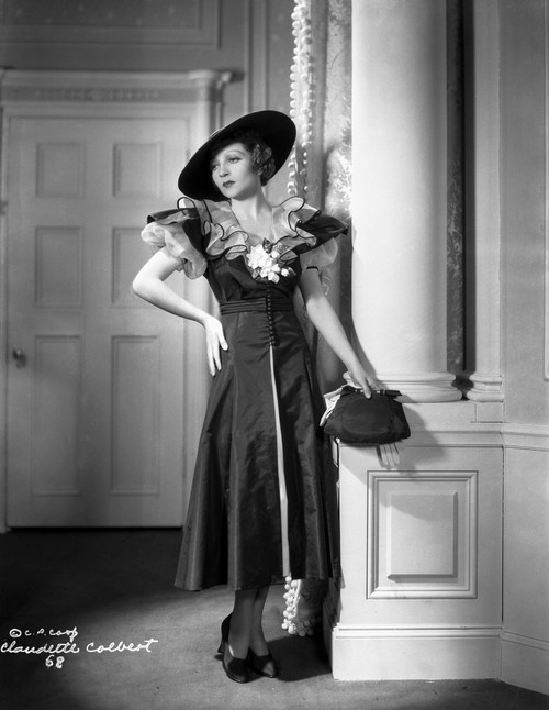 Claudette Colbert Posed in Black Dress with Hat Photo Print - Item # VARCEL688494