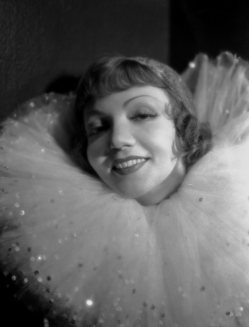 Claudette Colbert in White with Black Background Photo Print - Item # VARCEL688496