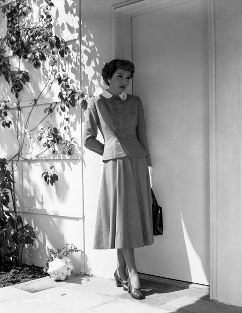 Claudette Colbert Leaning on Wall, wearing Formal Dress Photo Print - Item # VARCEL688499