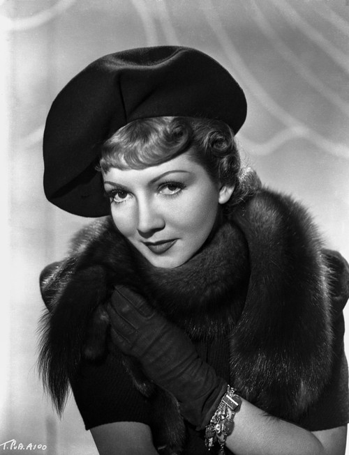Claudette Colbert Posed in Black Fur Dress with Hat Photo Print - Item # VARCEL688501