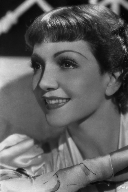 Claudette Colbert smiling in in Close Up Portrait Photo Print - Item # VARCEL688507