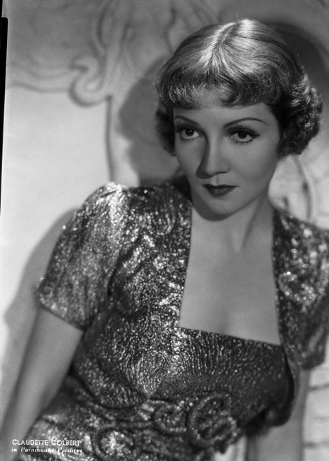 Claudette Colbert sitting in White Dress with Heels Photo Print - Item # VARCEL688516