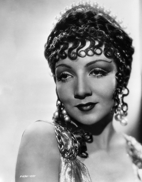 Claudette Colbert smiling in Close Up Portrait with Headdress Photo Print - Item # VARCEL688517