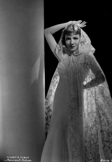 Claudette Colbert Posed in White Dress with Wedding Veil Photo Print - Item # VARCEL688523