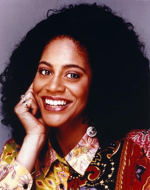 Kim Coles Leaning Chin On Hand in Gray Background Photo Print - Item # VARCEL688547