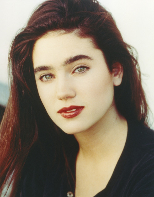 Jennifer Connelly Close Up Portrait in Black Shirt in White Background Photo Print - Item # VARCEL688572