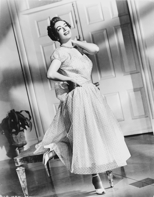 Joan Crawford wearing a cap-sleeved dress Photo Print - Item # VARCEL688748