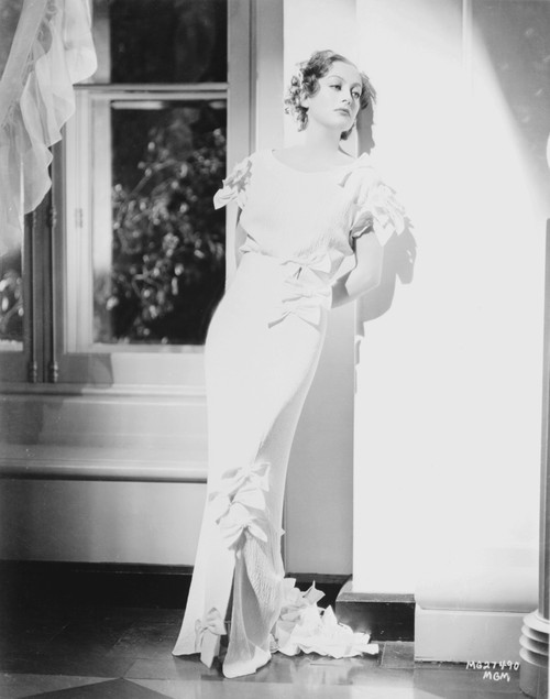 Joan Crawford leaning against a wall Photo Print - Item # VARCEL688745
