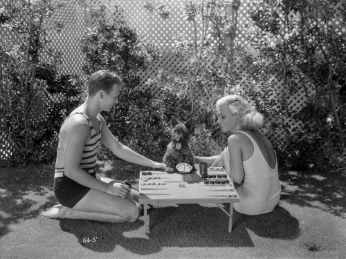 Joan Crawford Playing with a Guy in a Classic Portrait Photo Print - Item # VARCEL688800