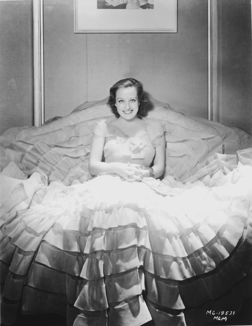 Joan Crawford wearing a cap-sleeve dress Photo Print - Item # VARCEL688798