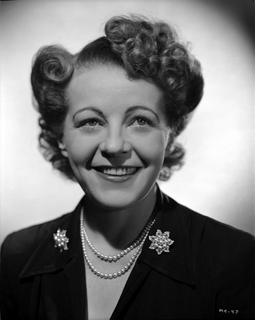 Mady Christians smiling in Black Dress with Pearl Necklace Photo Print - Item # VARCEL696124