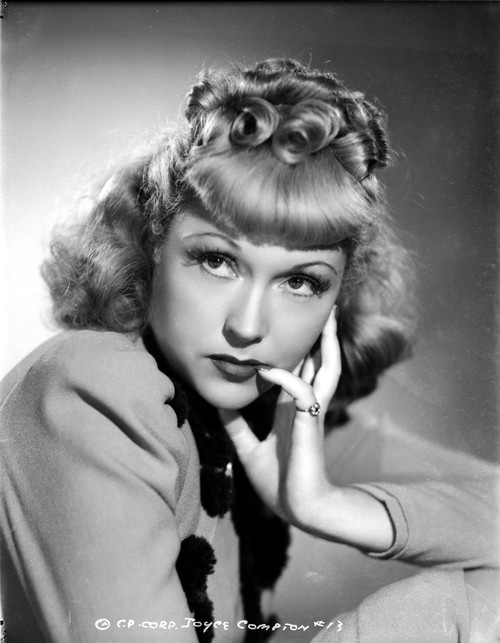 Joyce Compton wearing a Tunic and a Ring in a Classic Portrait Photo Print - Item # VARCEL696258