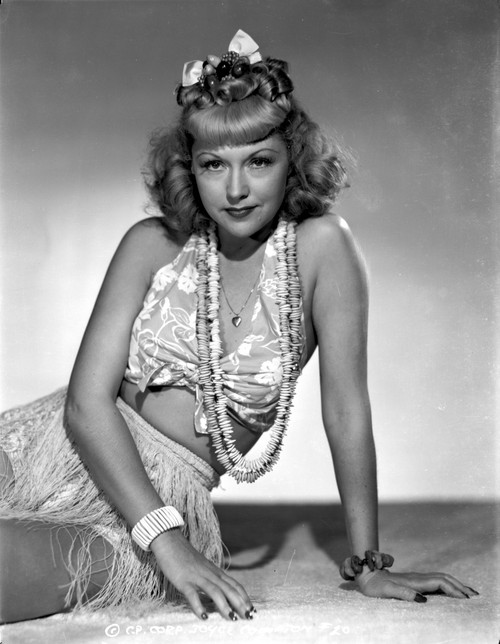 Joyce Compton sitting on the Ground and wearing a Two Piece in Classic Portrait Photo Print - Item # VARCEL696271