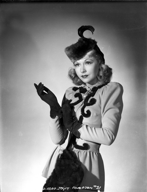 Joyce Compton wearing a Tunic Dress with Matching Gloves in a Classic Portrait Photo Print - Item # VARCEL696315