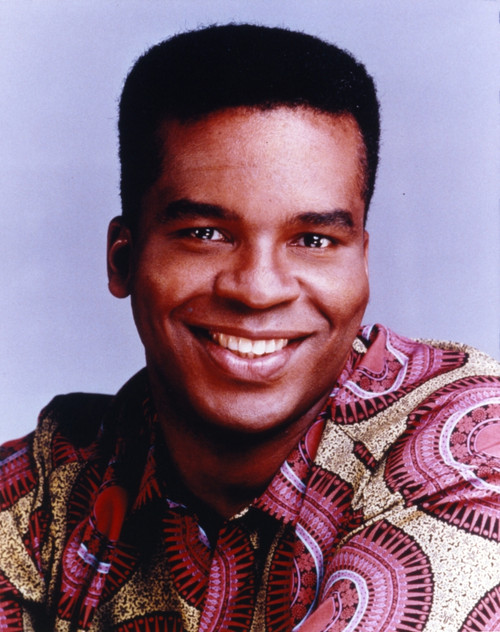 David Grier smiling in Red Shirt Photo Print - Item # VARCEL696365