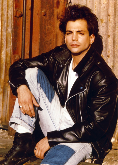 Richard Grieco Seated in Black Leather Jacket Photo Print - Item # VARCEL696361