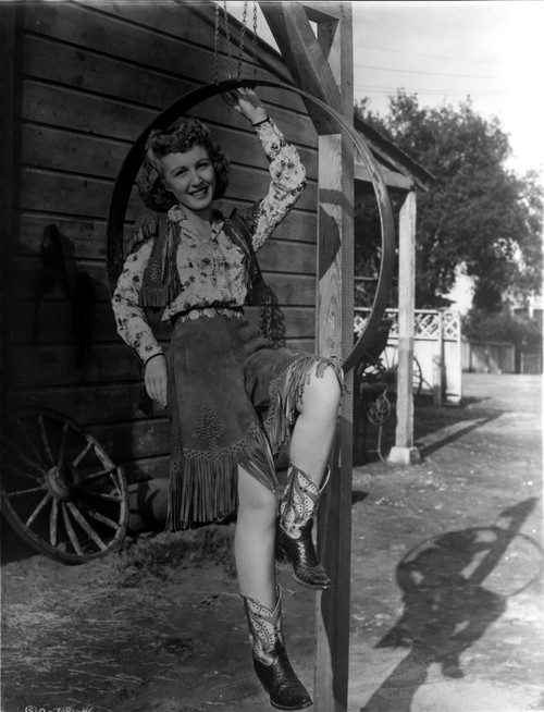 A Portrait Of Carolina Cotton in A Cowgirl Costume Photo Print - Item # VARCEL696427