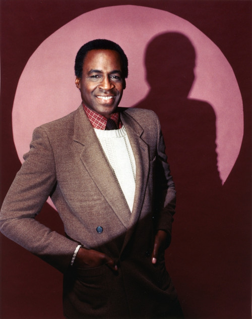 Robert Guillaume smiling in Brown Suit Photo Print - Item # VARCEL696454