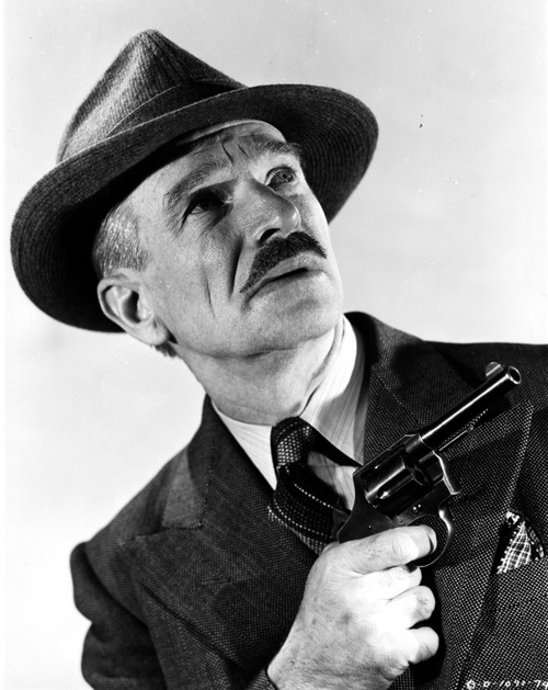 Ian Wolfe Posed in Suit and Tie with Gun and Hat Photo Print - Item # VARCEL696461