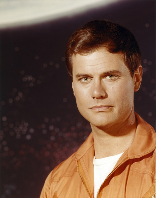 Larry Hagman Portrait in Orange Jacket Photo Print - Item # VARCEL696533