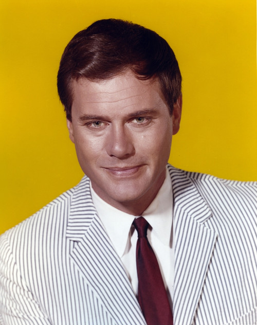 Larry Hagman Portrait in Yellow Background Photo Print - Item # VARCEL696541