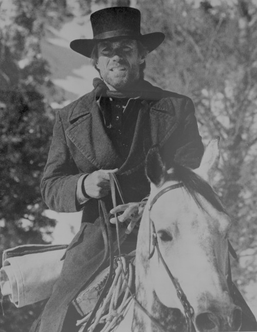 Clint Eastwood Ridding Horse in Black Coat with Hat Photo Print - Item # VARCEL696560