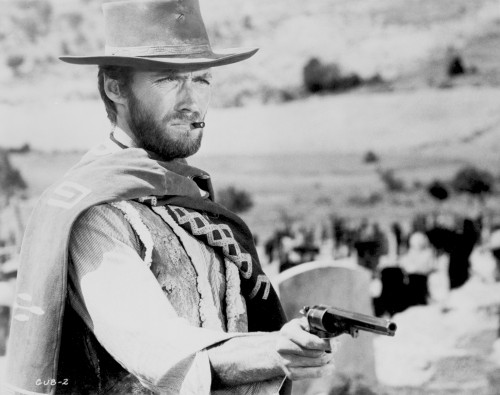 Clint Eastwood Posed in Cowboy Attire with Pistol Photo Print - Item # VARCEL696591