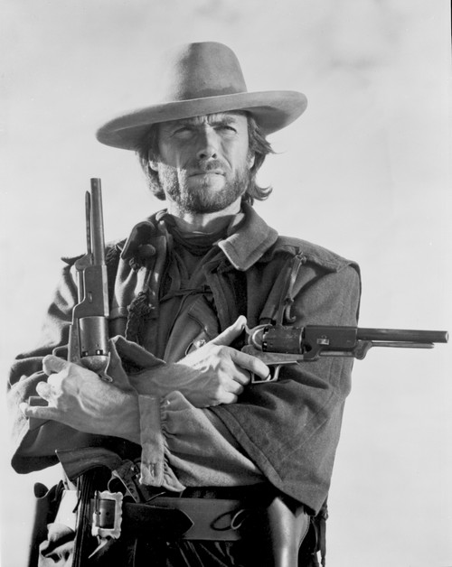 Clint Eastwood Posed in Cowboy Attire with Two Pistol Photo Print - Item # VARCEL696627