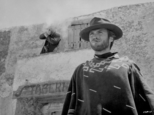 Clint Eastwood Looking Serious in Cowboy Attire with Cigarette in His Mouth Photo Print - Item # VARCEL696619