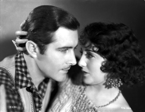 Bebe Daniels Ready to Kiss the Man in Polka Dot Collar Shirt while Holding His Head Photo Print - Item # VARCEL696642