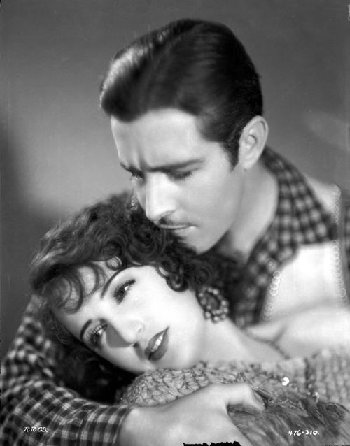 Bebe Daniels Lying on the Man's Arms in Knitted Dress Photo Print - Item # VARCEL696638