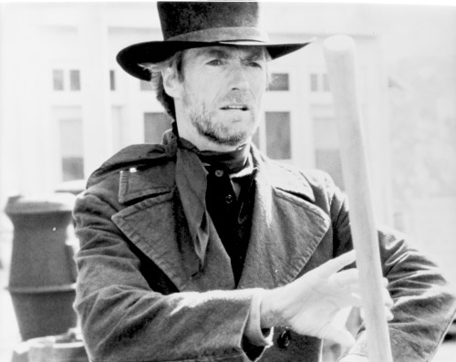Clint Eastwood Holding Stick in Classic Photo Print - Item # VARCEL696673