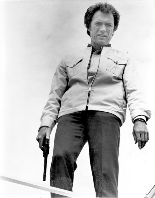 Clint Eastwood Posed in Jacket with Pistol Photo Print - Item # VARCEL696677