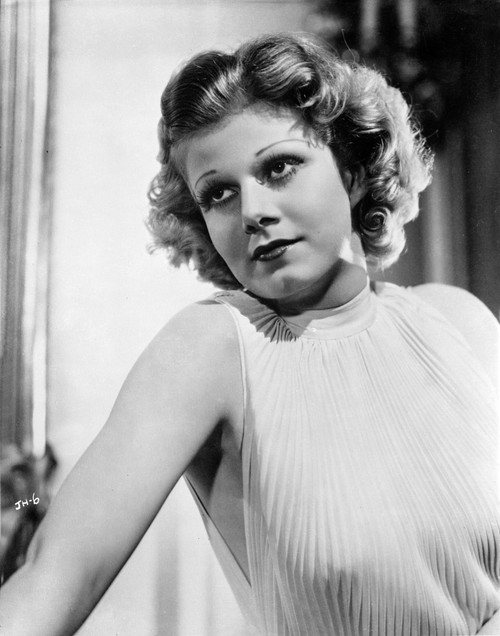 Jean Harlow Portrait in White High Neck Stripe Sleeveless Sheer Silk Dress with Right Arm Stretched to the Side and Eyes Looking Up Photo Print - Item # VARCEL696723