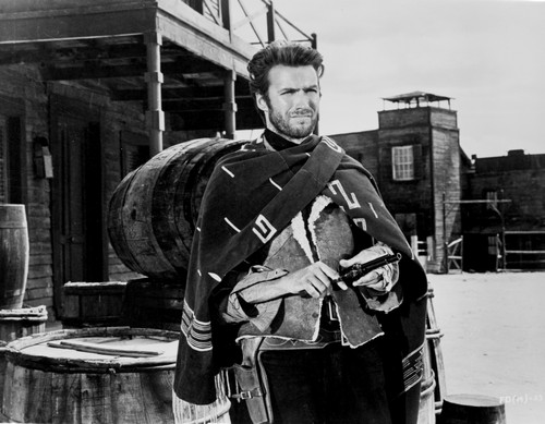 Clint Eastwood Looking Away in Cowboy Dress with Pistol Photo Print - Item # VARCEL696725